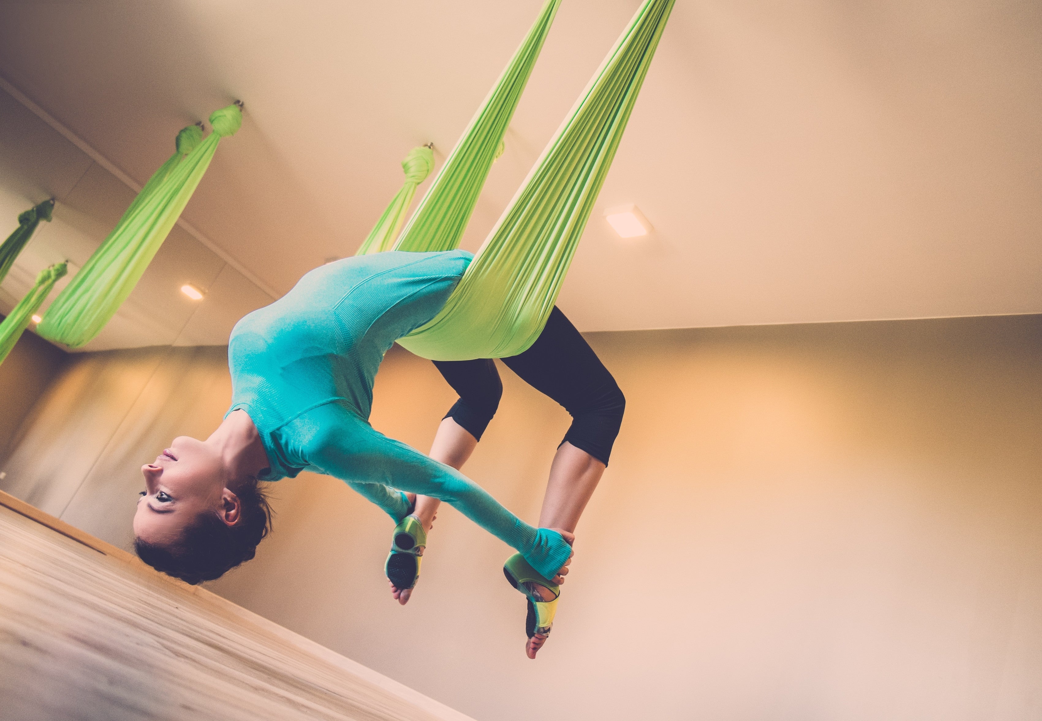 Lady in Green Yoga Hammock Backbend