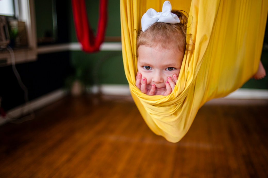 Ever heard of a Cuddle Hammock? Yoga Hammocks make great Sensory Swings