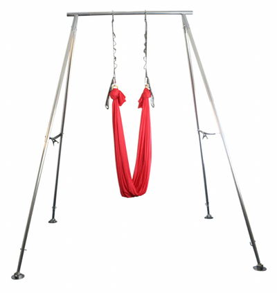 A red hammock hanging on an A-frame rig. 
