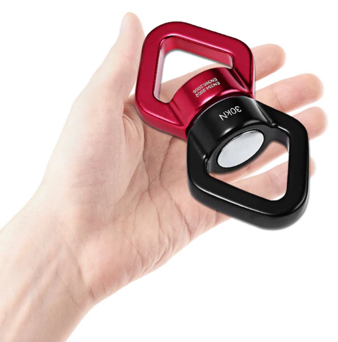 A person holding an aerial swivel in the palm of their hand.