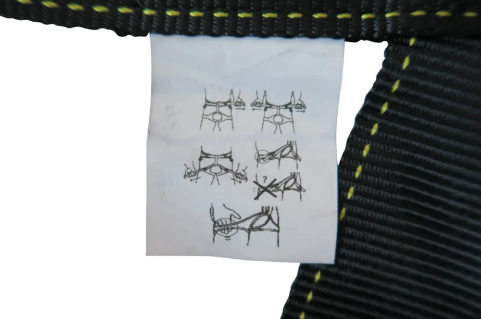 Close up of instruction tag on the bungee harness. 