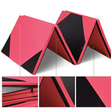 Thick exercise folding mat in pink and black folded in two pyramids. At the bottom of the image, there is a close-up of the black zipper and the fabric.