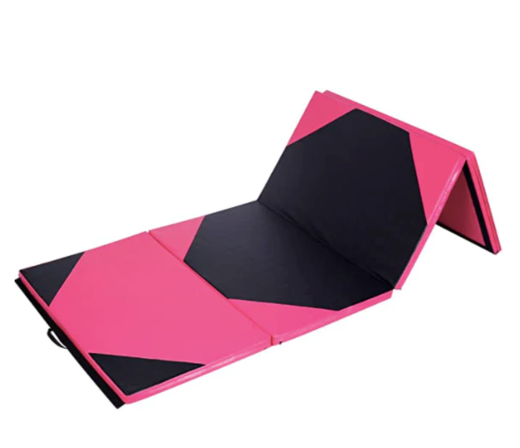 Pink and black exercise mat folded into a pyramid.