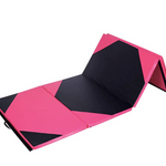 Pink and black exercise mat folded into a pyramid.